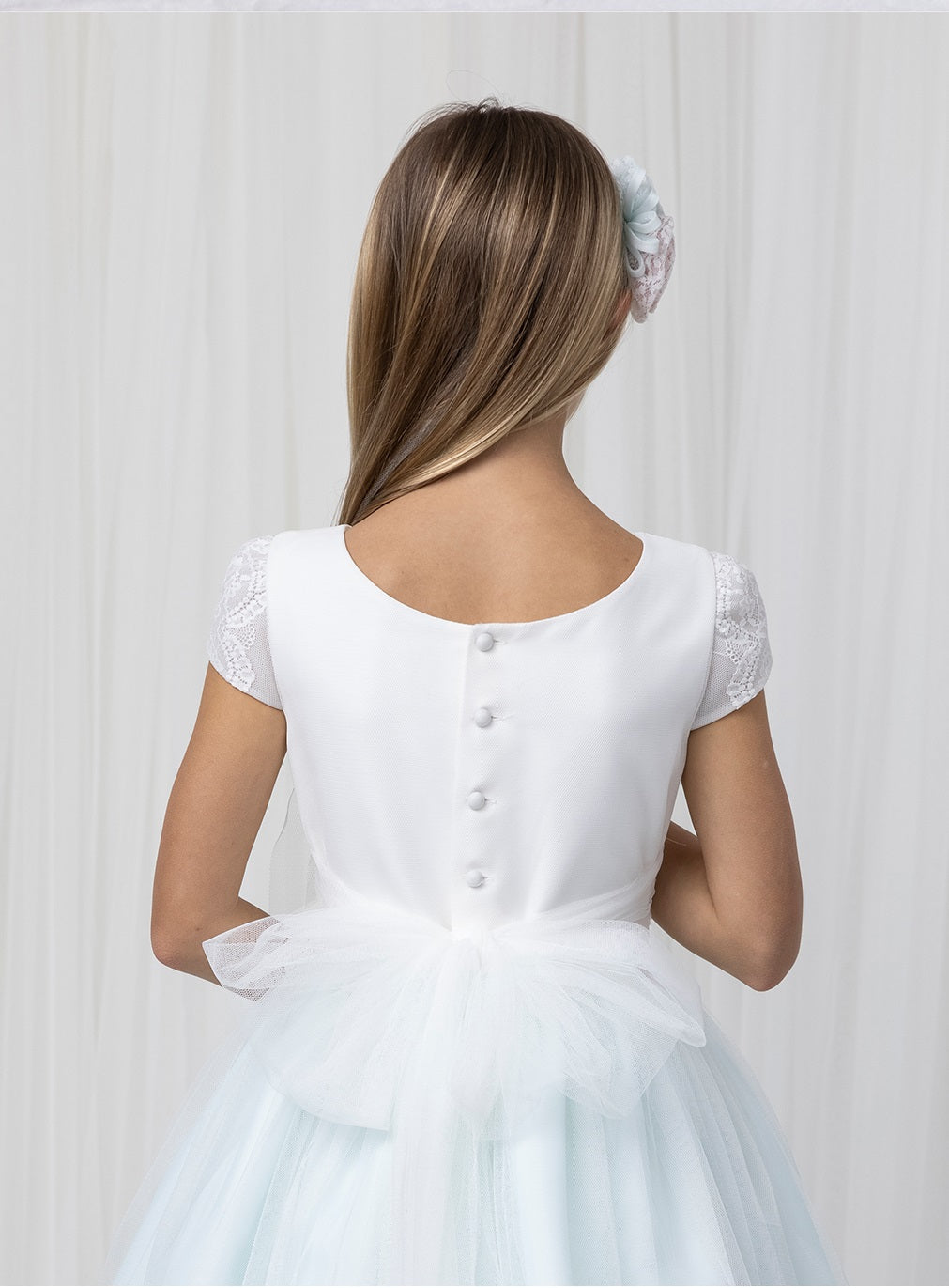 Vestido comunión falda rosa.