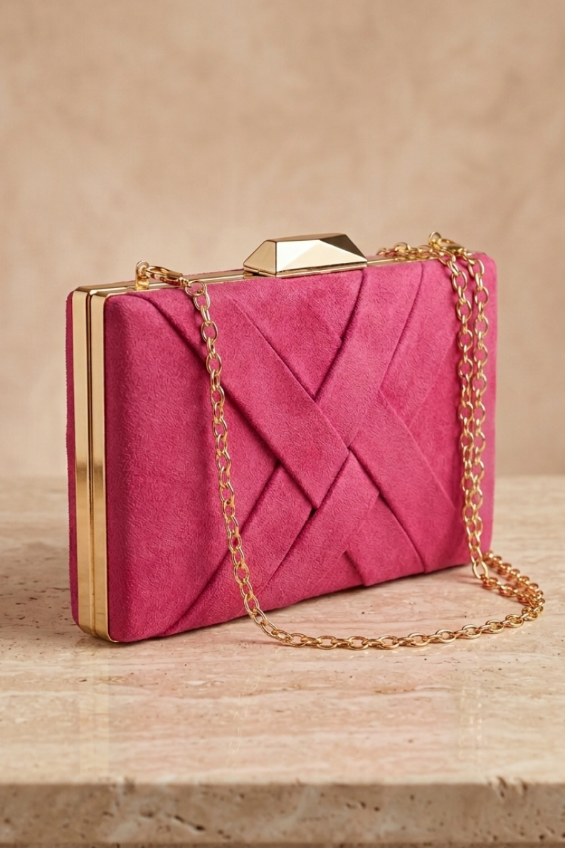 Bolso clutch de antelina fucsia