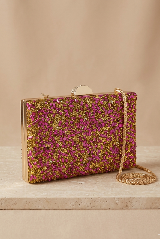 Bolso clutch joya dorado y fucsia