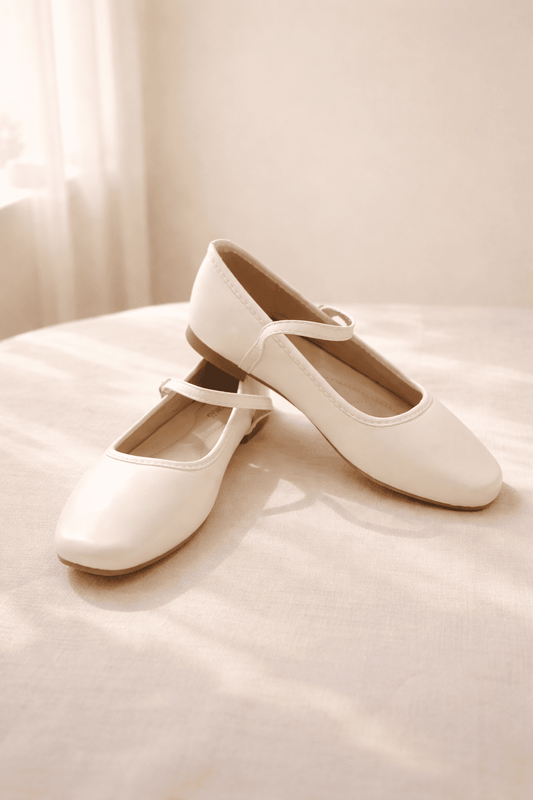 Zapatos de niña estilo bailarina marfil